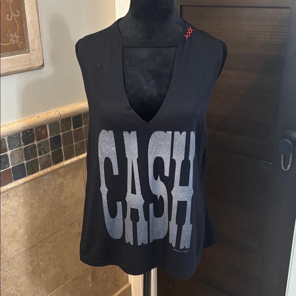 Black Sleeveless Graphic CASH Tee.